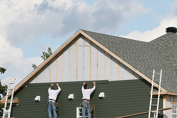 Professional Siding Repair technician working in Aurora, MN